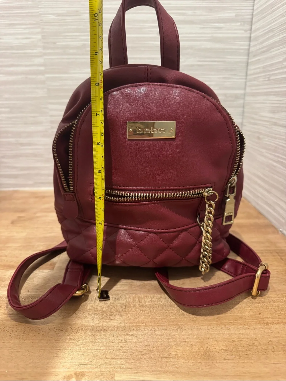 bebe Small Quilted Backpack in Burgundy with Gold Chain